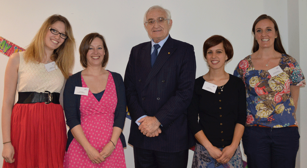 Professor Sir Mansel Ayiward and our student bursary holders Professor Sir Mansel Ayiward and our student bursary holders